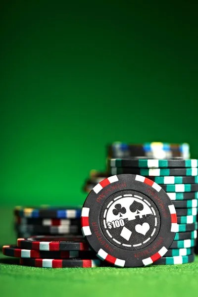 Dice container with two dice in mid-roll during live Dadu Online session